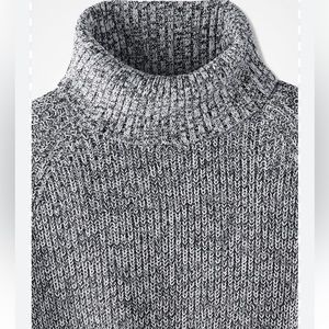 Black and white turtleneck sweater